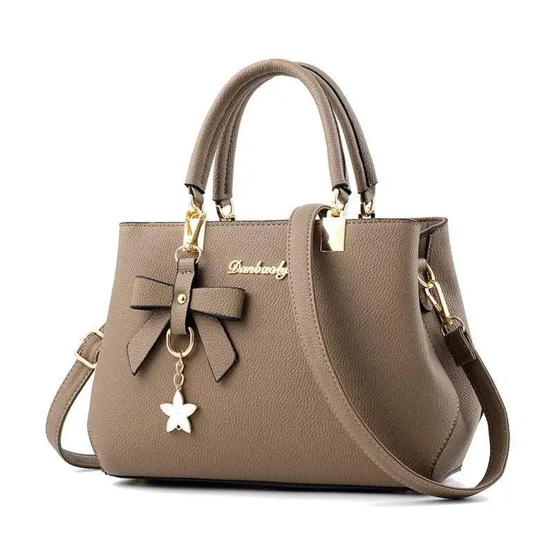 Bolsos de mensajero para mujer con colgante de flor, bolsos de moda para oficina para mujer, bolso puro para mujer, nuevos bolsos de hombro tipo bandolera