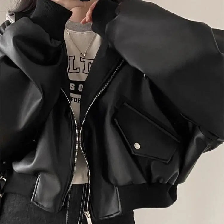 Chaqueta coreana de cuero PU negro de gama alta para mujer, moda holgada con capucha para primavera y otoño, ropa de abrigo versátil falsa de dos piezas con cremallera