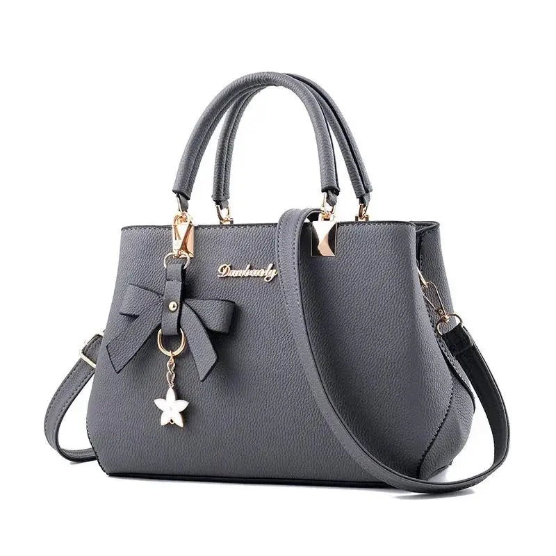 Bolsos de mensajero para mujer con colgante de flor, bolsos de moda para oficina para mujer, bolso puro para mujer, nuevos bolsos de hombro tipo bandolera