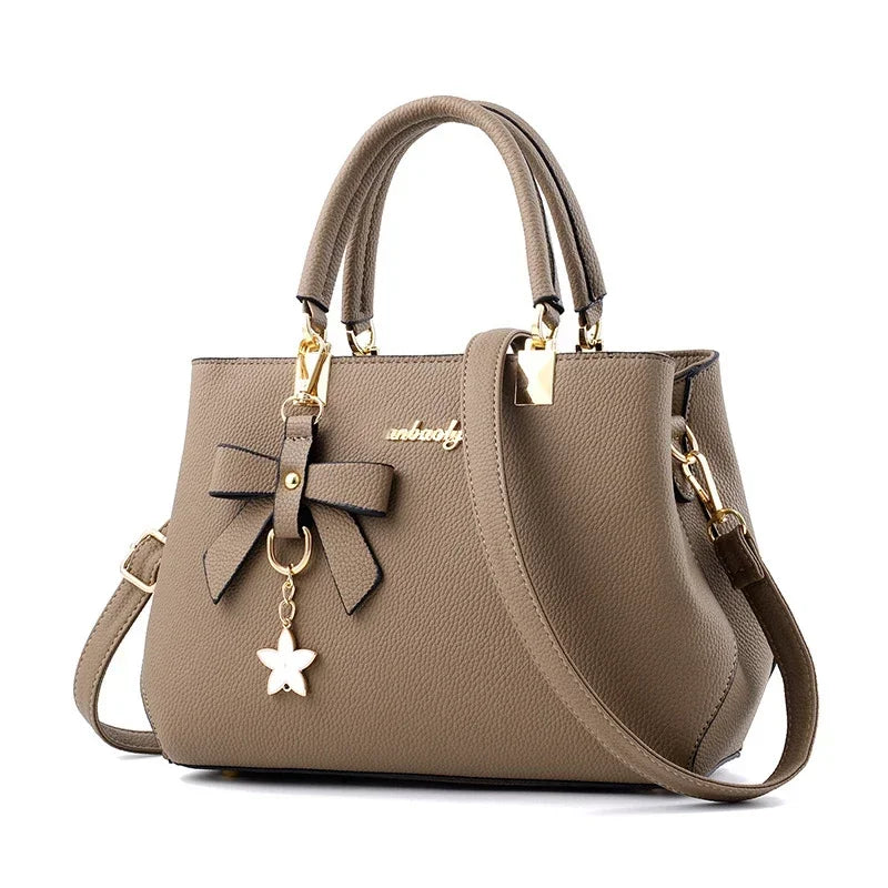 Bolsos de mensajero para mujer con colgante de flor, bolsos de moda para oficina para mujer, bolso puro para mujer, nuevos bolsos de hombro tipo bandolera
