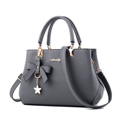 Bolsos de mensajero para mujer con colgante de flor, bolsos de moda para oficina para mujer, bolso puro para mujer, nuevos bolsos de hombro tipo bandolera