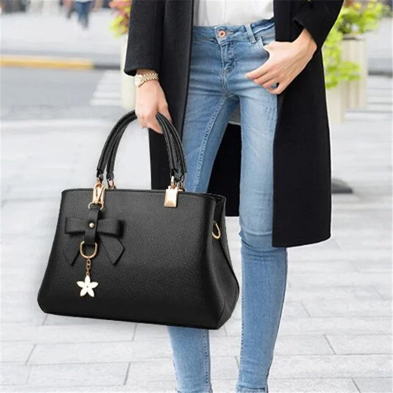 Bolsos de mensajero para mujer con colgante de flor, bolsos de moda para oficina para mujer, bolso puro para mujer, nuevos bolsos de hombro tipo bandolera