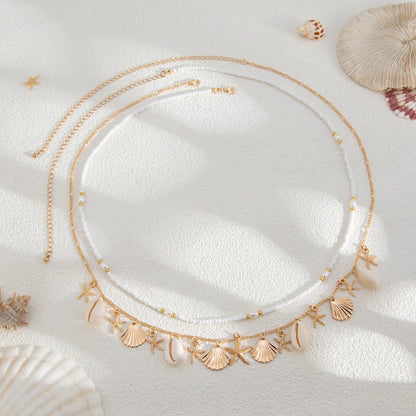 Cadena corporal de conchas marinas con dijes de estrella de mar y perlas, joyería de cintura bohemia ajustable, accesorio para festivales de playa para mujer.