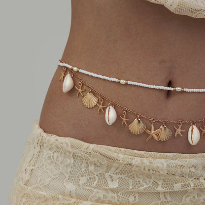 Cadena corporal de conchas marinas con dijes de estrella de mar y perlas, joyería de cintura bohemia ajustable, accesorio para festivales de playa para mujer.