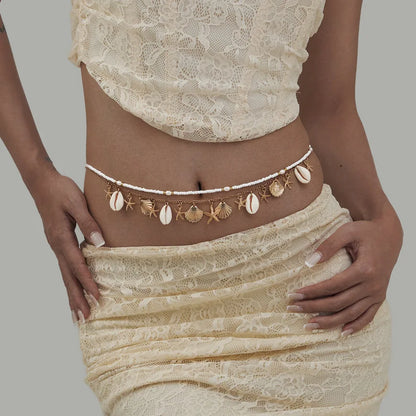 Cadena corporal de conchas marinas con dijes de estrella de mar y perlas, joyería de cintura bohemia ajustable, accesorio para festivales de playa para mujer.